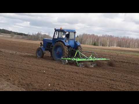 Видео: МТЗ 50 культивирует с новым культиватором БОМЕТ.MTZ 50 kultivuojamas su nauju kultivatoriumi BOMET.