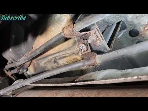 Видео: Как заменить трос аварийного тормоза Nissan Frontier, крепеж, извлечение застрявшего заднего ротора