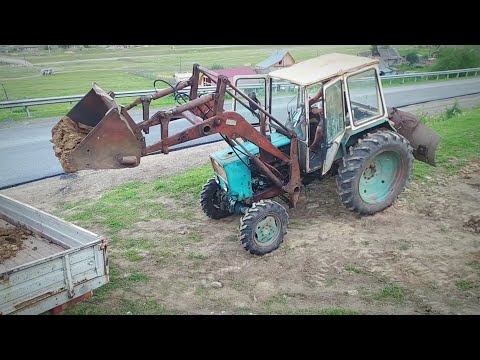 Видео: Погрузка глины трактором Т-40АМ с кабиной ЮМЗ