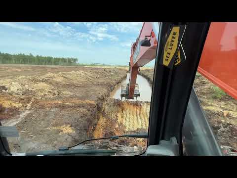 Видео: Север, копаем траншею фильтрационную