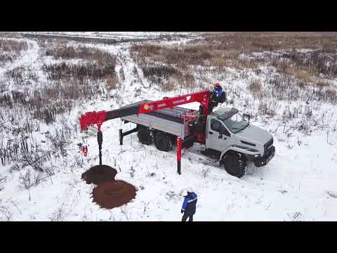 Видео: УРАЛ NEXT с бурильно-крановой установкой Taurus 086A