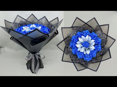 Видео: DIY | Как легко сделать букет из денег и роз из атласных лент | Упаковка круглого букета