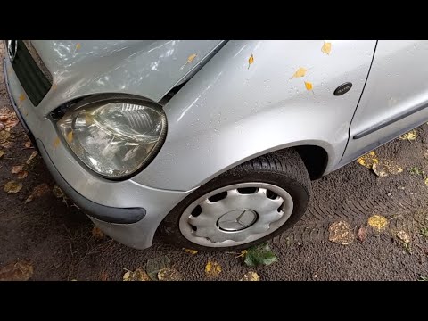 Видео: Mercedes A class W168 замена лампочек в передних фарах