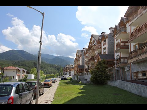 Видео: Двустаен апартамент с камина и ниска такса в Банско