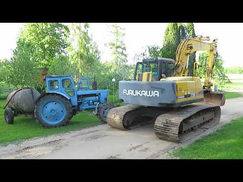 Видео: Экскаватор очищает пруд. LV .