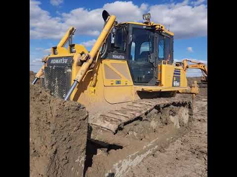 Видео: Как управлять Komatsu D65 ex16  Краткий обзор