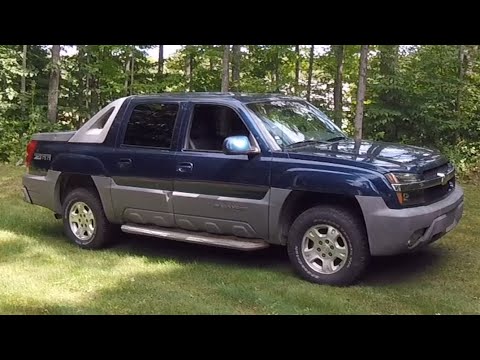 Видео: Что мне нравится в Chevrolet Avalanche 5.3 2WD 2002 года