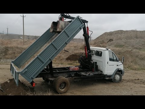 Видео: грейферный погрузчик