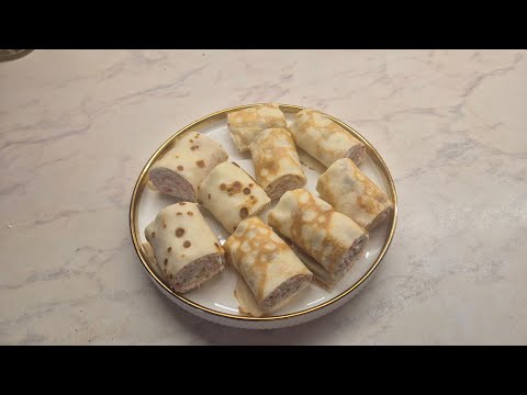 Видео: Блинные рулетики с крабами.