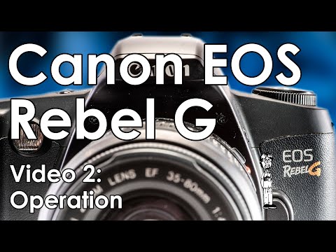 Видео: Canon EOS Rebel G (500N, New Kiss): замена аккумулятора, загрузка плёнки, объективов, функций и р...