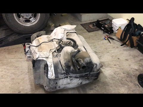 Видео: Устранение неполадок датчика уровня топлива и пикапа Ford Excursion