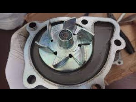 Видео: Mitsubishi Lancer X замен помп и термом Mitsubishi Lancer X replacement of water pump and thermostat