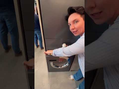 Видео: Стираем и сушим пуховик в машинах Kuppersbusch. Зачем нужны теннисные мячики??