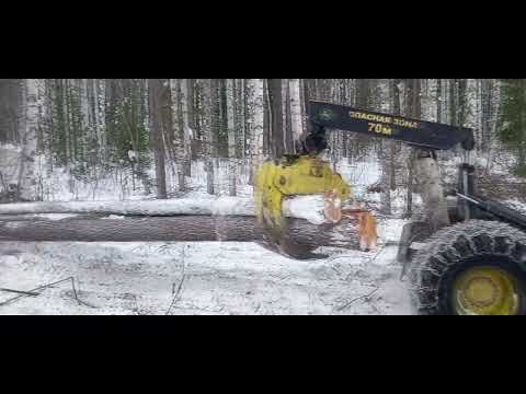 Видео: Скиддер John Deere 748G Серия III (Skidder)