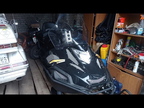 Видео: Стелс Ставр Снегоход, обзор, первый снегоход в моей жизни)))