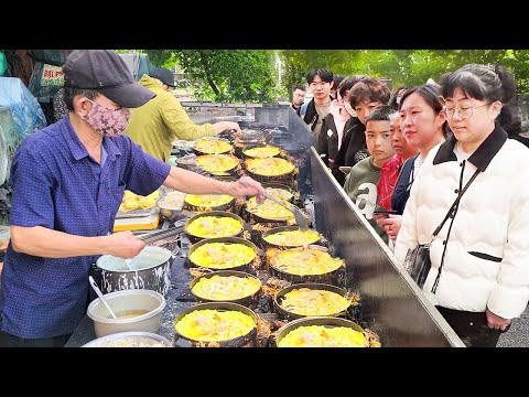 Видео: Исследуем самый оживленный рынок уличной еды в Сайгоне, Вьетнам