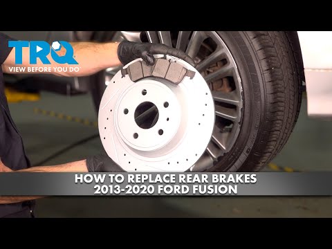 Видео: Как заменить задние тормоза Ford Fusion 2013-2020