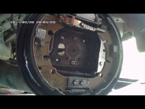 Видео: Замена задних тормозных колодок на Ford Fusion