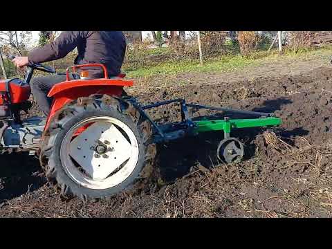 Видео: Янмар  1500 з двох корпусним плугом 2.20
