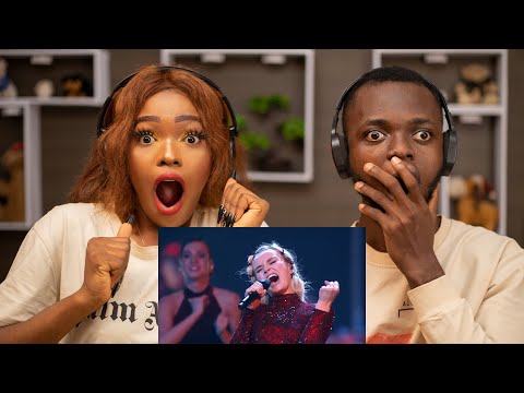 Видео: OUR FIRST TIME HEARING Polina Gagarina - (Live at Megasport) ~ Полина Гагарина - Шагай REACTION!!!😱