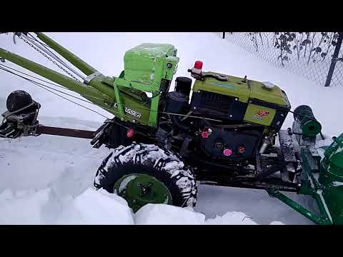 Видео: Уборка слежавшегося снега самодельным снегоуборщиком для мотоблока