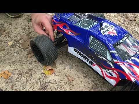 Видео: Подробный обзор Himoto Katana (E10XT): демонстрация компонентов с описанием и тесты на бездорожье