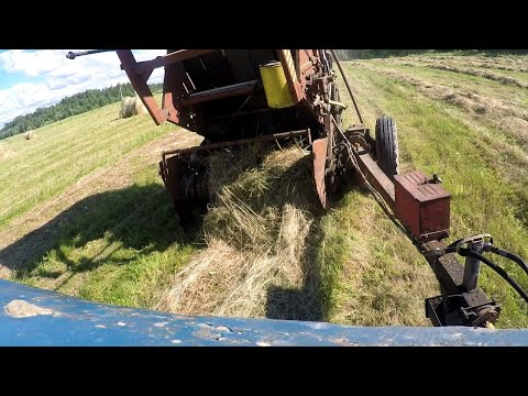 Видео: Сгребание сена в валки граблями ГВК-6!Прессование сухой массы пресс-подборщиком ПРП-1,6!(2й день)