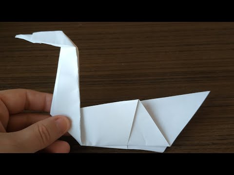 Видео: Лебедь из бумаги как сделать оригами