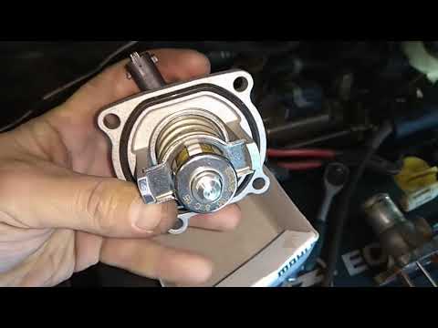 Видео: Замена термостата  Opel Astra H