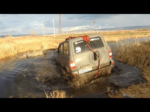 Видео: Грязевая заруба! Isuzu Bighorn vs UAZ Patriot (Nortec ET-500 vs Goodyear Wrangler Duratrac). OffRoad