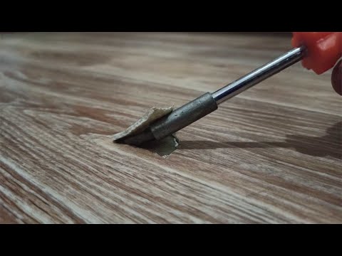 Видео: САМЫЙ ПРОСТОЙ СПОСОБ ОТРЕМОНТИРОВАТЬ ПОРВАННЫЙ ЛИНОЛИУМ.