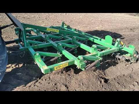 Видео: МТЗ 82.1 с культиватором КПН 3 03 Проминь.Первая культивация.