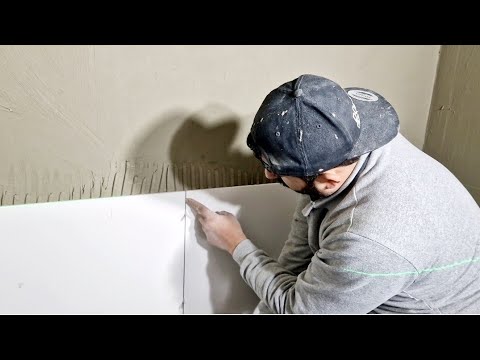 Видео: КАК НАЙТИ ОТПРАВНУЮ ТОЧКУ ПРИ УКЛАДКЕ ПЛИТКИ И КЕРАМИКИ НА СТЕНУ?