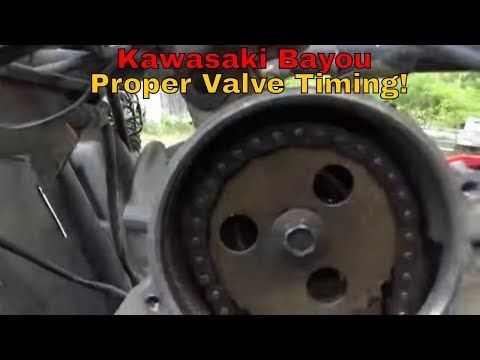 Видео: Kawasaki Bayou 300, не крутит коленвал, низкая компрессия, неправильные фазы газораспределения — ...