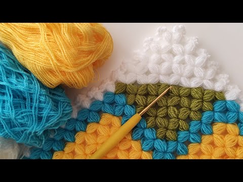 Видео: простой узор пуховки крючком для разных проектов - салфетка крючком и мочалка