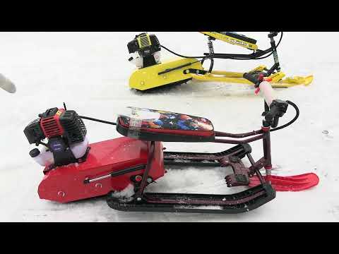 Видео: Снегокаты с мотором от бензотриммера. Обзор.