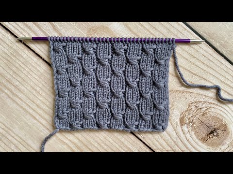 Видео: ЭКСПРЕСС-ВИДЕО | УЗОР С ОБВИТИЕМ ПЕТЕЛЬ - 2Й СПОСОБ | КРАСИВЫЙ УЗОР ДЛЯ ШАПКИ ИЛИ СВИТЕРА