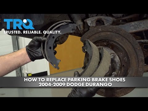 Видео: Как заменить колодки стояночного тормоза на Dodge Durango 2004-2009