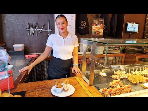 Видео: Вкусная уличная еда Пальма-де-Майорка на Меркадо-де-Оливас