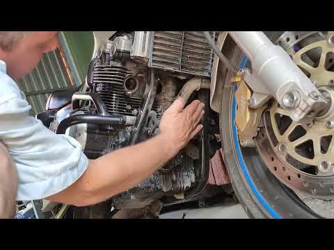 Видео: Работа honda CB 400 vtec без выпускного коллектора