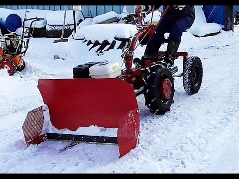 Видео: МТЗ 09Н  Уборка снега с адаптером