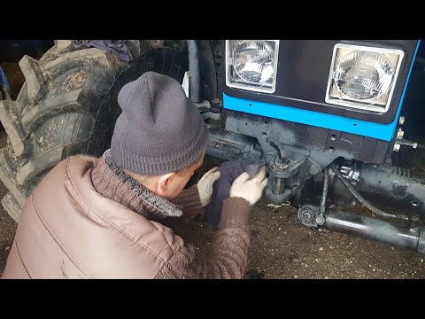 Видео: Трактор Мтз-82 обслуживание балочного моста(масло), советы и подсказки.