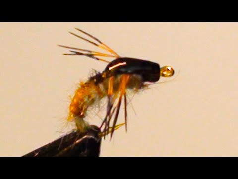 Видео: Мушка для ловли хариуса и ленка осенью