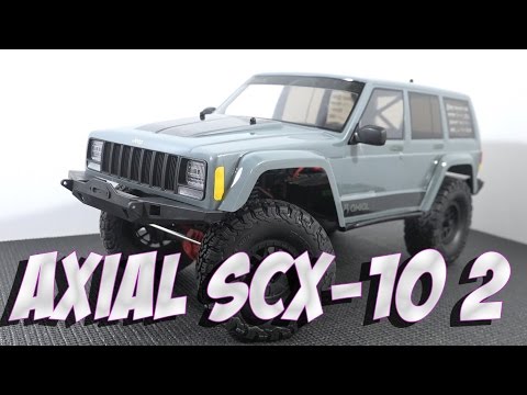 Видео: Обновленный Аксиал ... Axial SCX10 ii, радиоуправляемая трофи модель