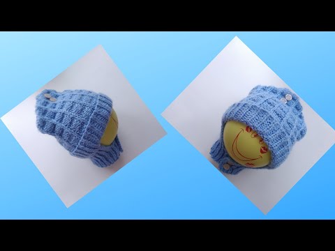 Видео: Шапка шлем с модной макушкой спицами. Без швов.