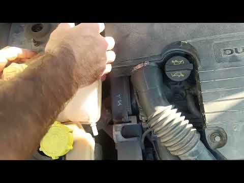 Видео: Причина утечки охлаждающей жидкости в автомобиле Ford Fusion 2006
