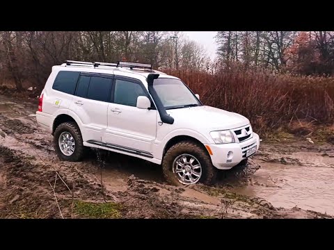 Видео: Лифт подвески . MITSUBISHI MONTERO 20 anniversary special edition . Pajero 3 . 35/12.5R18.тест драйв