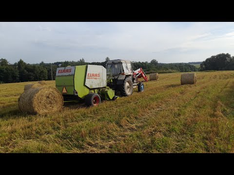 Видео: Солома.Граблю и кручу рулоны.