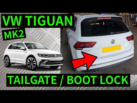 Видео: VW TIGUAN MK2 — Как снять замок крышки багажника