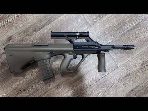 Видео: Инструкции по установке и обзор прицела Steyr Aug STG 77 1.5X